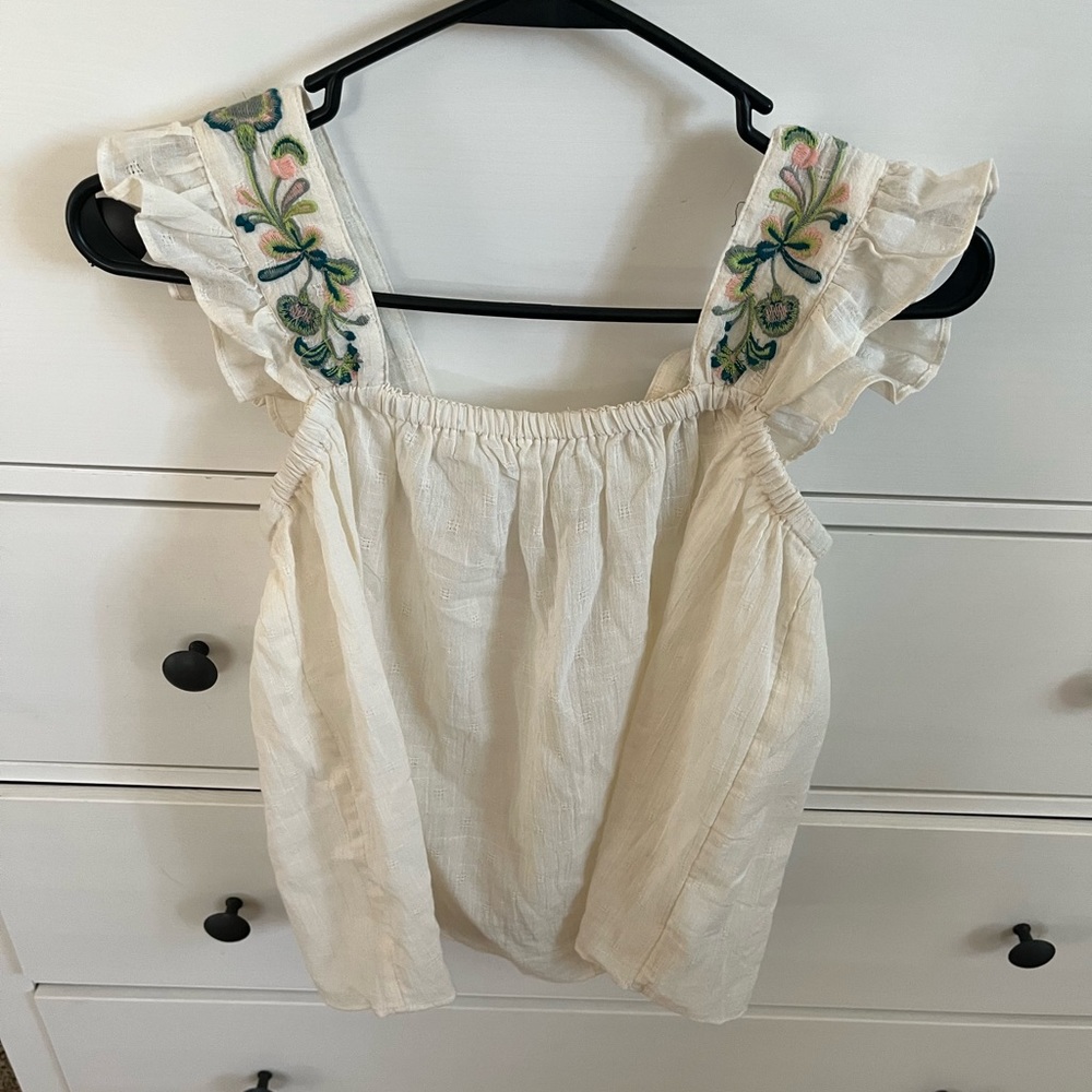 Madewell white embroidered ruffle tank top.